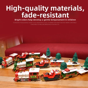 Detailed view of vintage Christmas electric train set with Santa Claus and festive cars