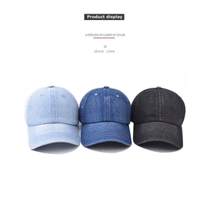 Detailed comparison of vintage washed denim baseball caps in blue and charcoal grey tones