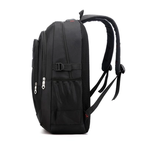 Detail view of large capacity black travel backpack with multi-layer zippers and side mesh pocket