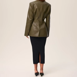 Detail of fitted olive green PU leather jacket back with waist stitching and cuff buttons