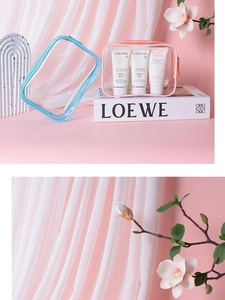 Detailed view of pink and blue PVC waterproof toiletry bags with transparent compartments