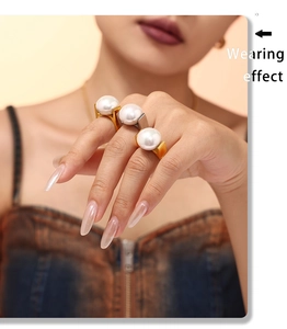 Close-up of 18K gold plated pearl ring showing wearing effect and realistic size