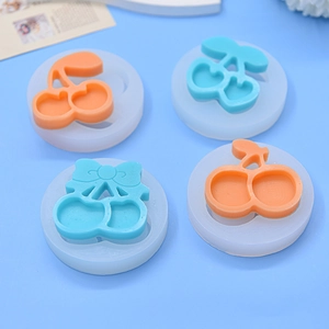 DIY cherry shaped silicone mold set for keychain pendants in blue and orange colors