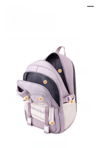 Detailed view of the purple and beige school backpack showing large capacity and multi-pockets
