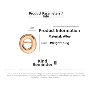 Detail view of irregular hollow gold ring with specific size 3cm x 3.5cm and 6.8g weight
