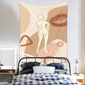Detail of Bohemian tapestry with minimalist female line art in earth tones over a cozy bed