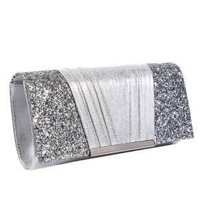 Elegant silver glitter evening clutch bag with metallic trim for formal dinner parties