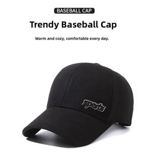 Detailed view of a black baseball cap with sports embroidery on a white background.