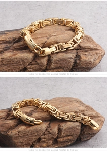 Detail of gold Byzantine link titanium steel bracelet for men with industrial folding clasp
