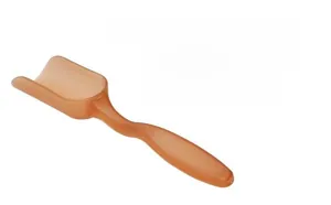 Detail of amber translucent plastic tea scoop with ergonomic long wavy handle and deep U-shape