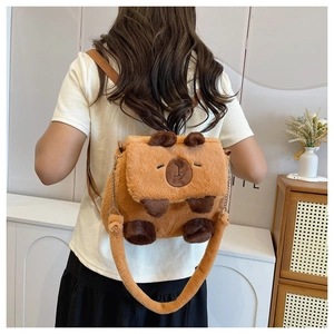 Rear view of a model wearing a cute brown plush capybara backpack in a cozy room