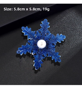 Blue snowflake brooch with pearl center and glitter finish, size 5.8cm x 5.8cm