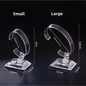 Transparent acrylic watch display stands in two sizes with dimensions on black background