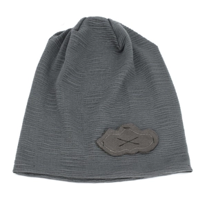 Detail of dark grey knit beanie featuring a cloud patch and ribbed texture fabric