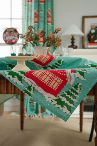 Detailed Christmas tablecloth with snow-covered tree and cottage pattern on cotton linen