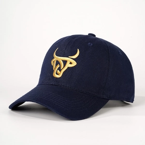 Vintage adjustable navy blue cotton baseball cap with golden bull head embroidery on front