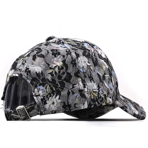 Floral embroidery baseball cap with black lace overlay and metal buckle adjustment