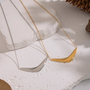 Minimalist geometric V-shape pendant necklaces in gold and silver finish on stones
