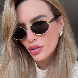 Vintage oval metal sunglasses with smoke lenses and golden rope textured hoop earrings