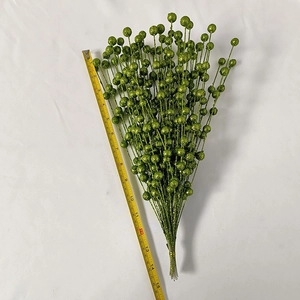 Detail of green glitter berry stem with measuring tape showing 40cm length