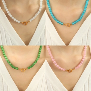 Cat eye beaded necklace set in four vibrant colors with a golden spring clasp
