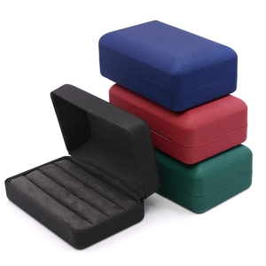 Premium multi-color jewelry storage boxes with velvet interior slots for rings and earrings