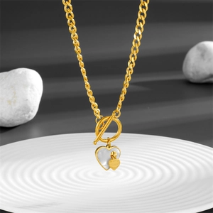 Gold OT clasp heart necklace with white shell pendant and engraved small heart tag