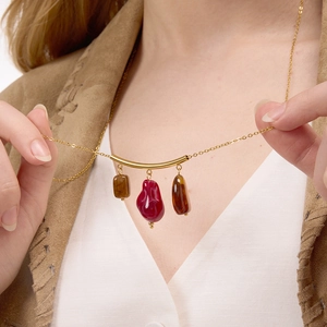 Vintage stainless steel necklace with colorful resin stones worn by a model