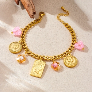 Vintage gold-plated Cuban chain jewelry set with embossed coin and crystal heart charms