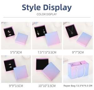Detailed view of assorted gradient pink jewelry boxes with various sizes and black foam inserts