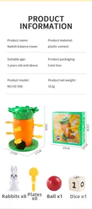 Detailed view of carrot balance tower toy components including rabbits, boards and die