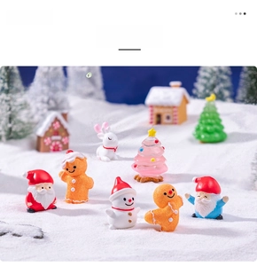 Miniature Christmas resin figurines set featuring Santa Claus and snowman decor