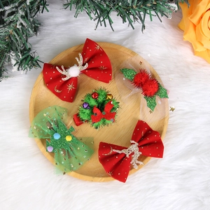 5-piece Christmas hair clip set featuring reindeer antlers, bows, and festive floral designs