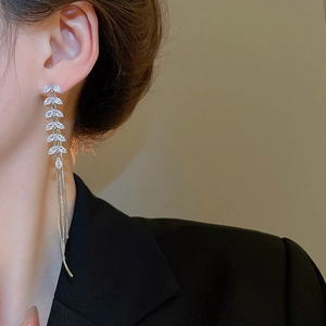 Long tassel wheat leaf earrings with silver needle and sparkling zircon on model
