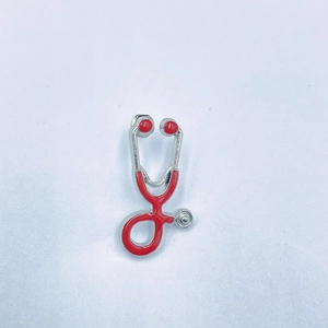 Creative stethoscope brooch with red enamel and silver polished metal for doctors