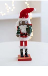 Detailed close-up of a 27cm wooden Santa nutcracker soldier with plush beard and red suit
