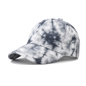 Detailed view of the gray and white tie-dye canvas fabric texture on this baseball cap