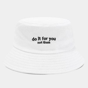 White cotton bucket hat with black embroidered letters shown from a front perspective