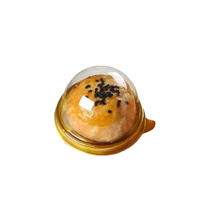 Transparent round packaging box for egg yolk pastry with black sesame and gold base