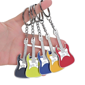 Guitar-shaped metal bottle opener keychains in five colors on a white background