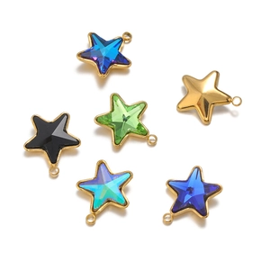 Detailed view of colorful star-shaped pendant charms with gold plated borders