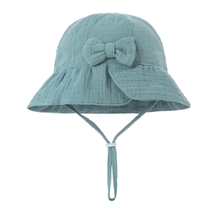 Detail of baby cotton sun hat with bow decoration and adjustable white chin strap