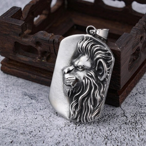 Vintage stainless steel rectangular lion head embossed pendant with a retro silver finish