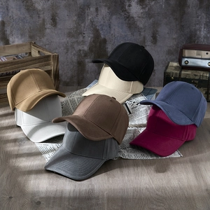 Classic solid color adjustable baseball caps in various colors for men and women