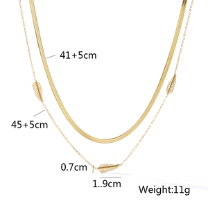 Detail of double-layer titanium necklace showing feather pendant and chain dimensions