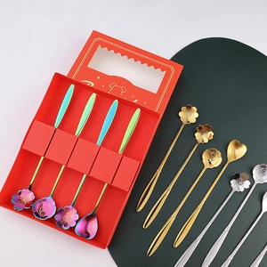 Golden flower and heart shaped stainless steel long handle spoons in a red gift box