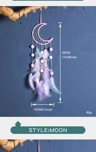 Detail shot of moon-shaped dream catcher with pastel feathers and sizing specs