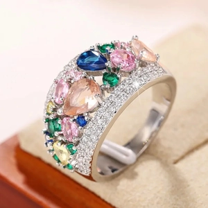 Silver wide band ring with colorful pear-shaped gemstones and sparkling crystals