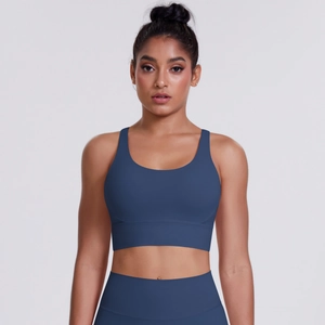 Close-up of navy blue sports bra and high-waist yoga pants in matte high-stretch fabric