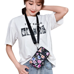 Floral mini crossbody phone bag for women with adjustable strap and floral pattern